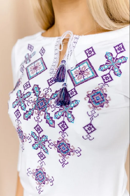 Act Fast Women's short sleeve white shirt with cross-stitch embroidery. Purple